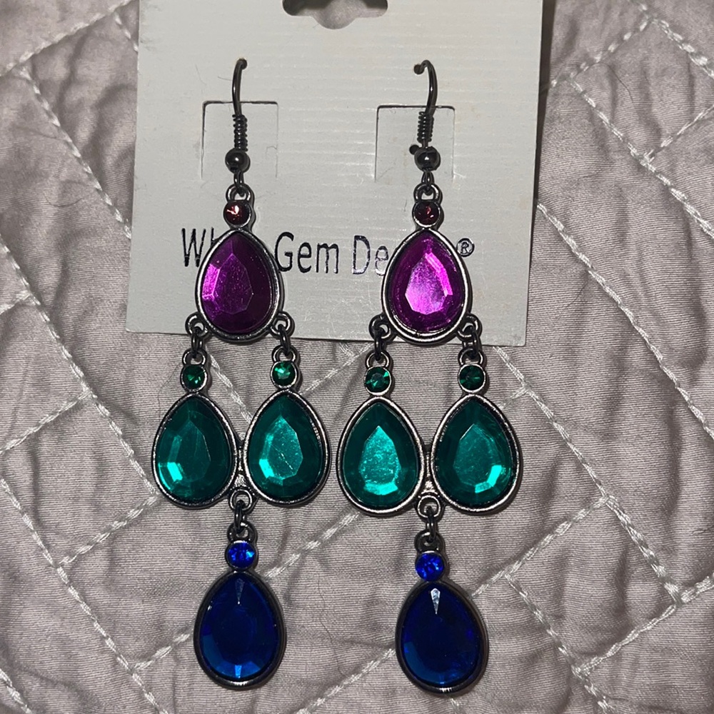 Purple, green, and blue stoned dangle earrings.